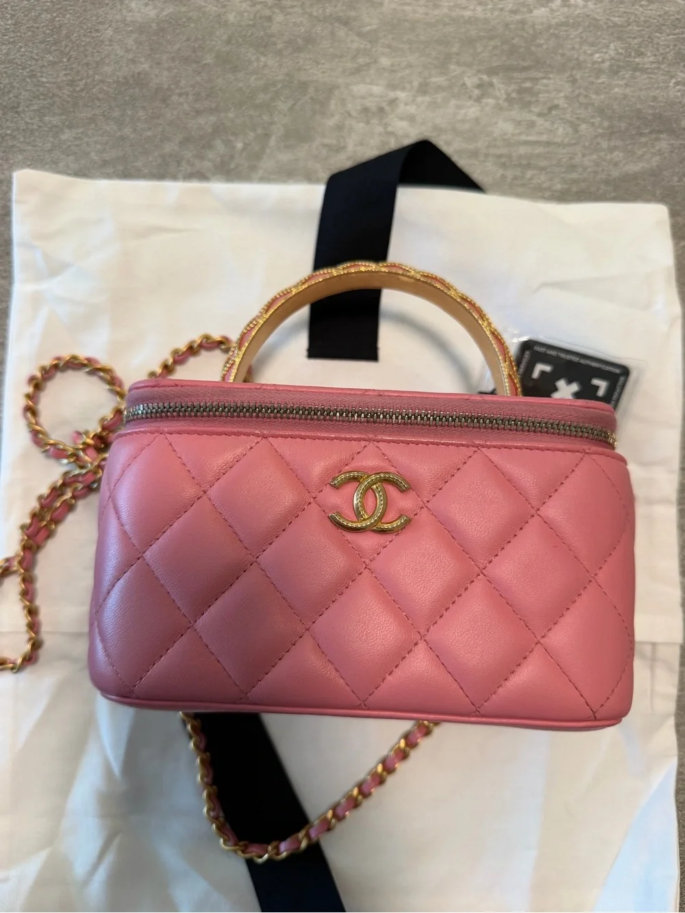 Lambskin Quilted Metal Twist Small Top Handle Vanity Case With Chain Pink.